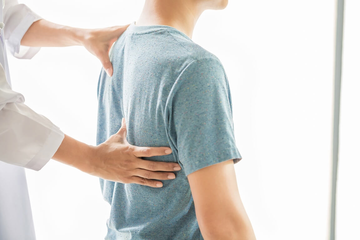 Боли в спине: причины и лечение